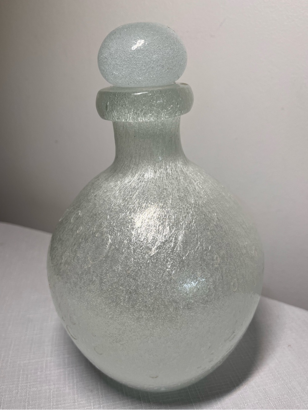 Vintage white glass decanter 
distinct bubbly texture 
matching stopper
8.5”